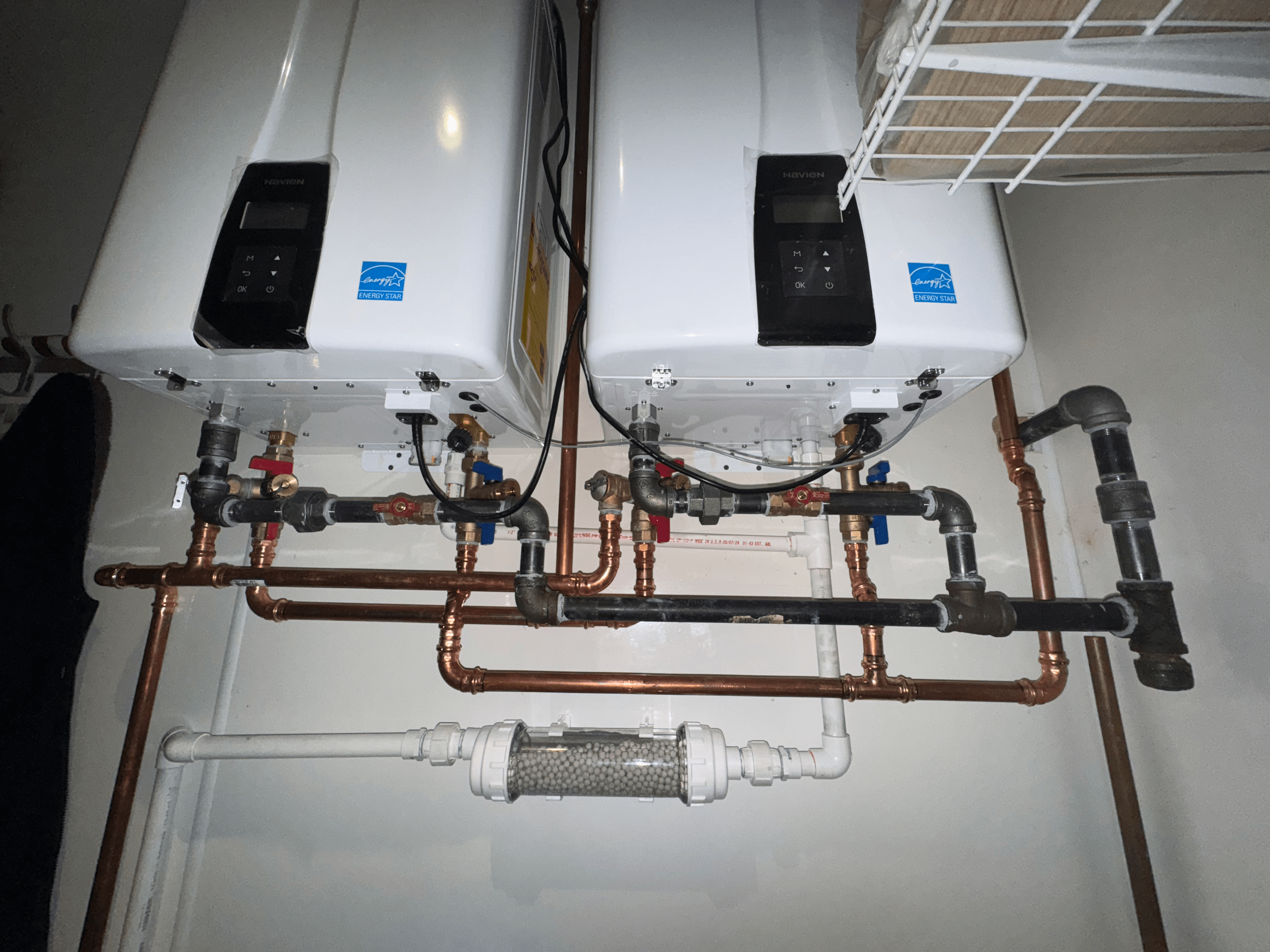 tankless water heater installation view from underneath