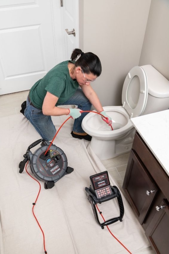 Camera inspection equipment being used by AJ Services